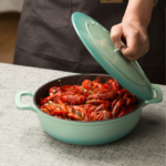 healthy cooking with enamel cast iron pot on stovetop